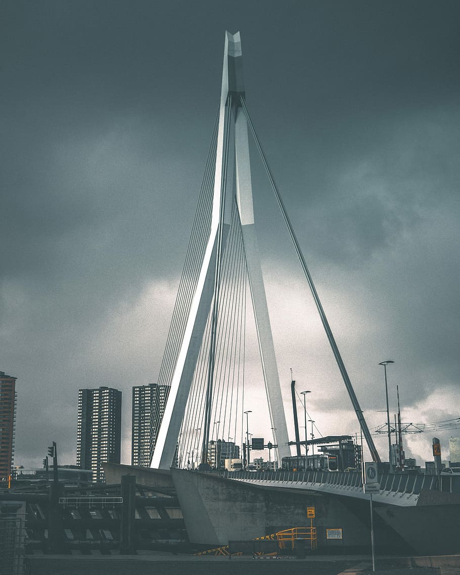 gray suspension bridge under gray clouds, gray Bridge under gray sky HD wallpaper