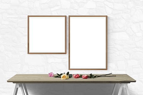 two brown wooden photo frames in front of brown wooden console table HD wallpaper