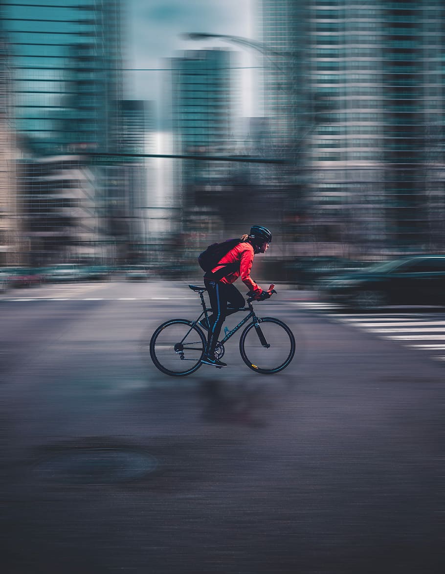 HD wallpaper: person riding nbicycle, man riding road bicycle on  intersection | Wallpaper Flare