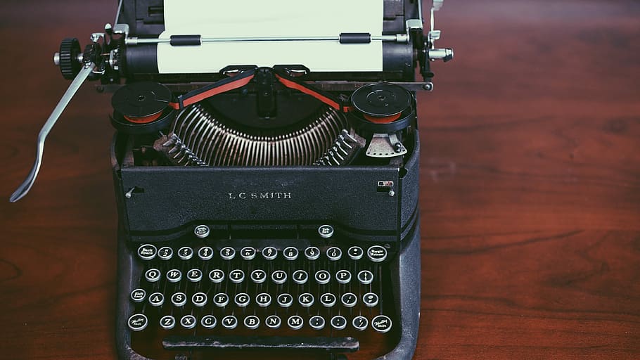 black typewriter machine, top view photography of black and white typewriter HD wallpaper
