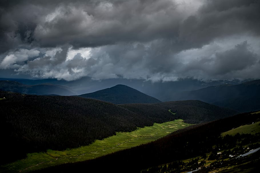 gray clouds on mountains, aerial photo of mountain under white sky HD wallpaper