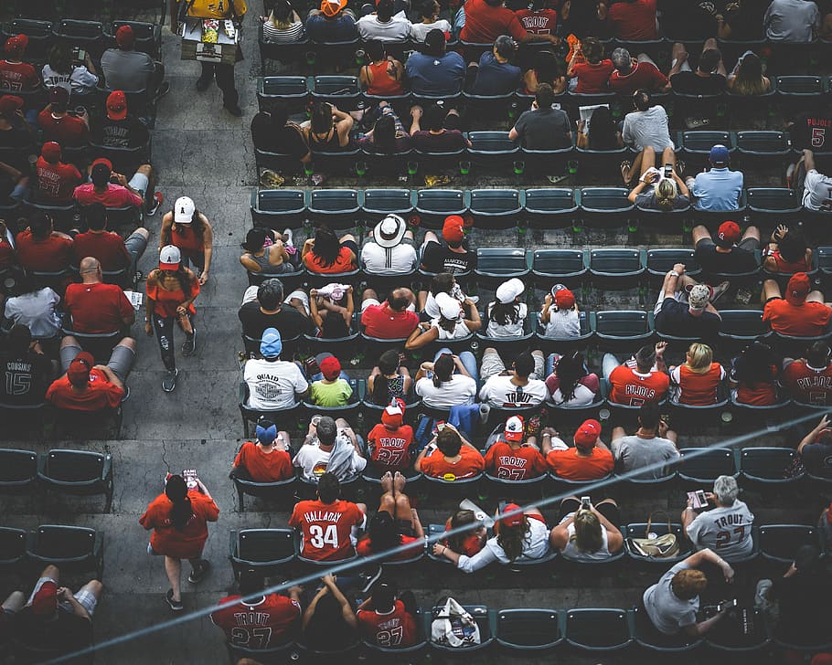 aerial photography of people sitting on gang chair, crowd on black bench watching game HD wallpaper
