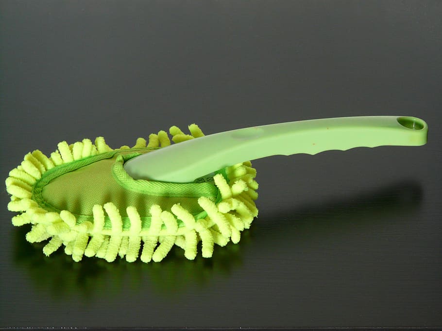green handheld mop on brown wooden surface, feather duster HD wallpaper