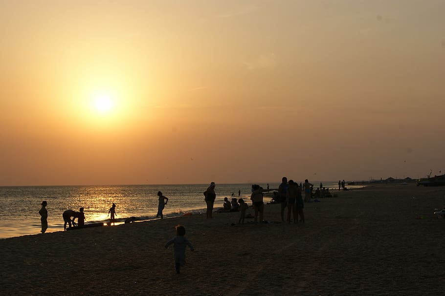 sunset, sea, beach, landscape, summer, boy, silhouettes, sky HD wallpaper