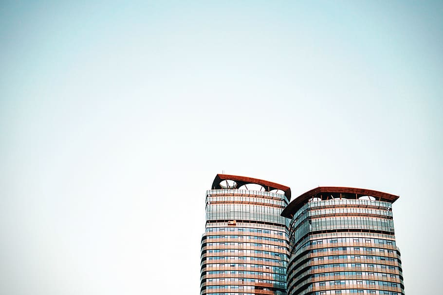 two brown concrete buildings, red, gray, daytime, sky, architecture HD wallpaper