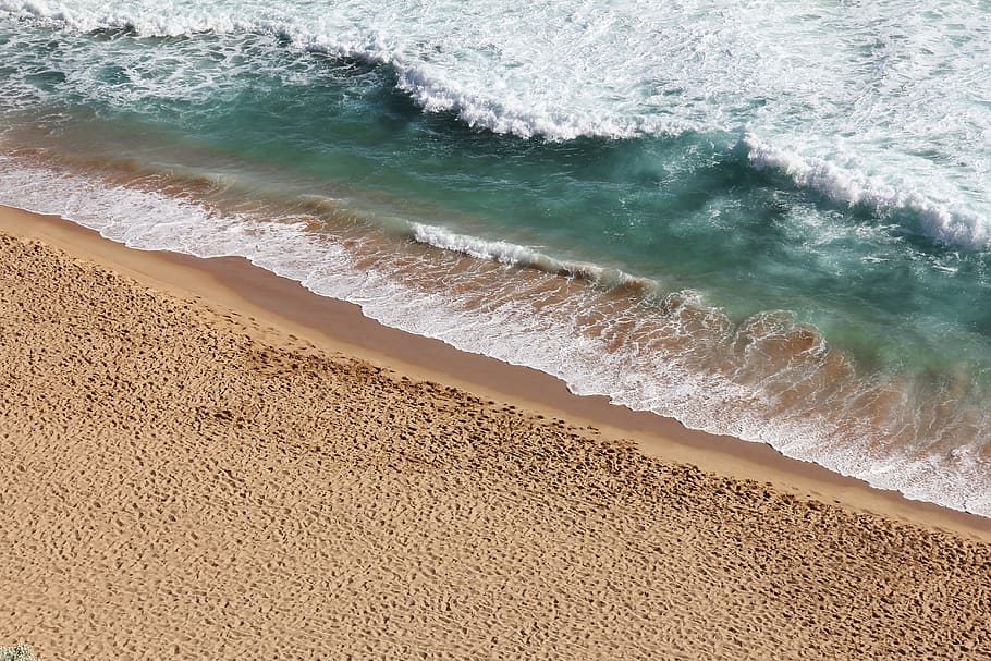 aerial photography of ocean, brown sand next to sea with waves HD wallpaper