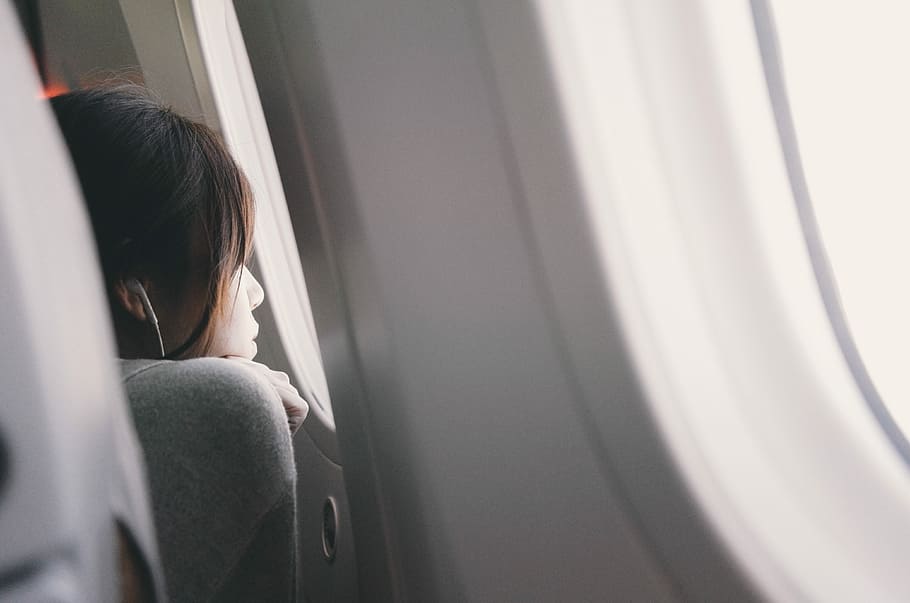 woman looking plane mirror, woman looking at airplane window HD wallpaper