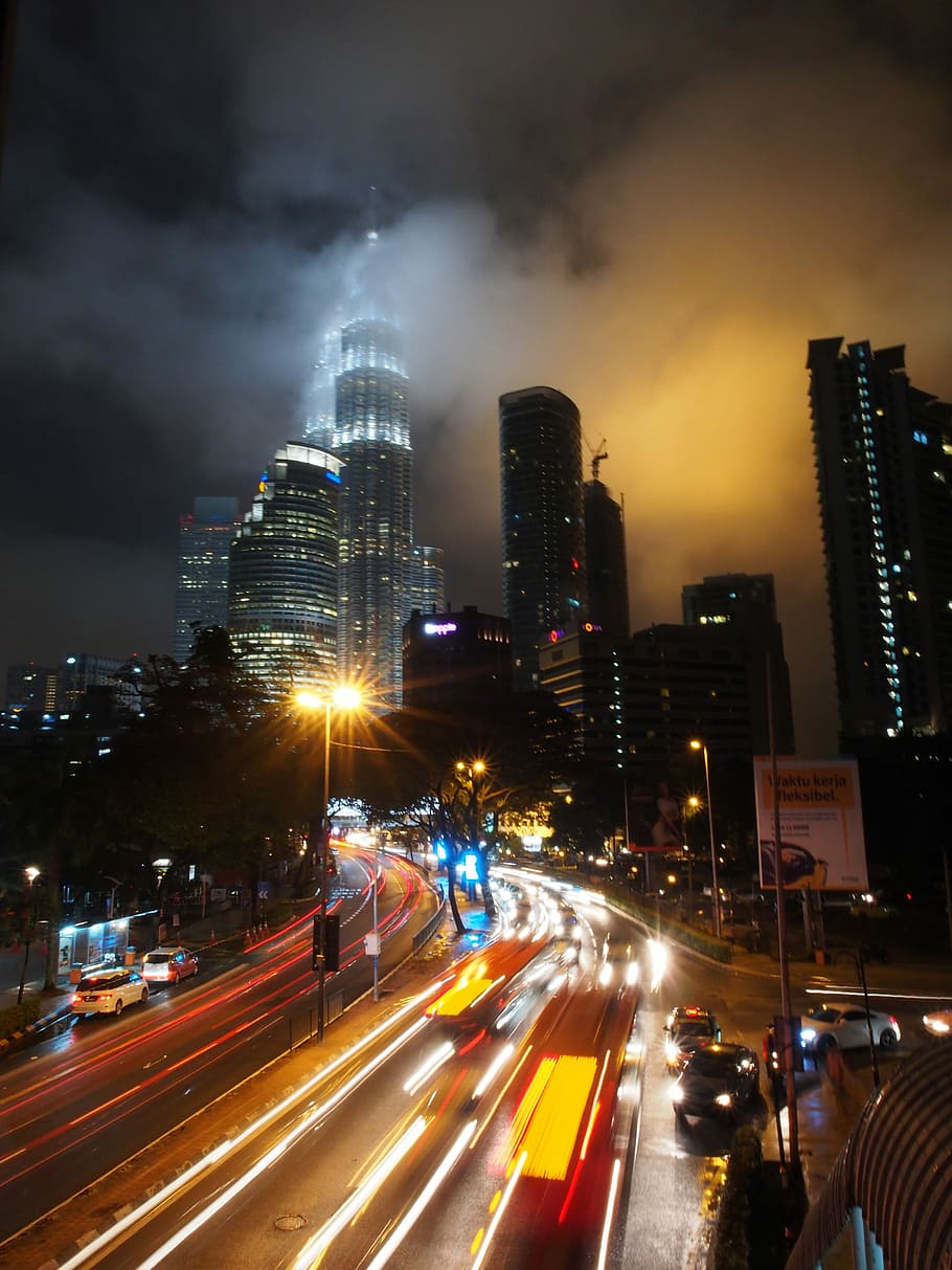 Nighttime tower and streets in Kuala Lumpur, Malaysia, photos