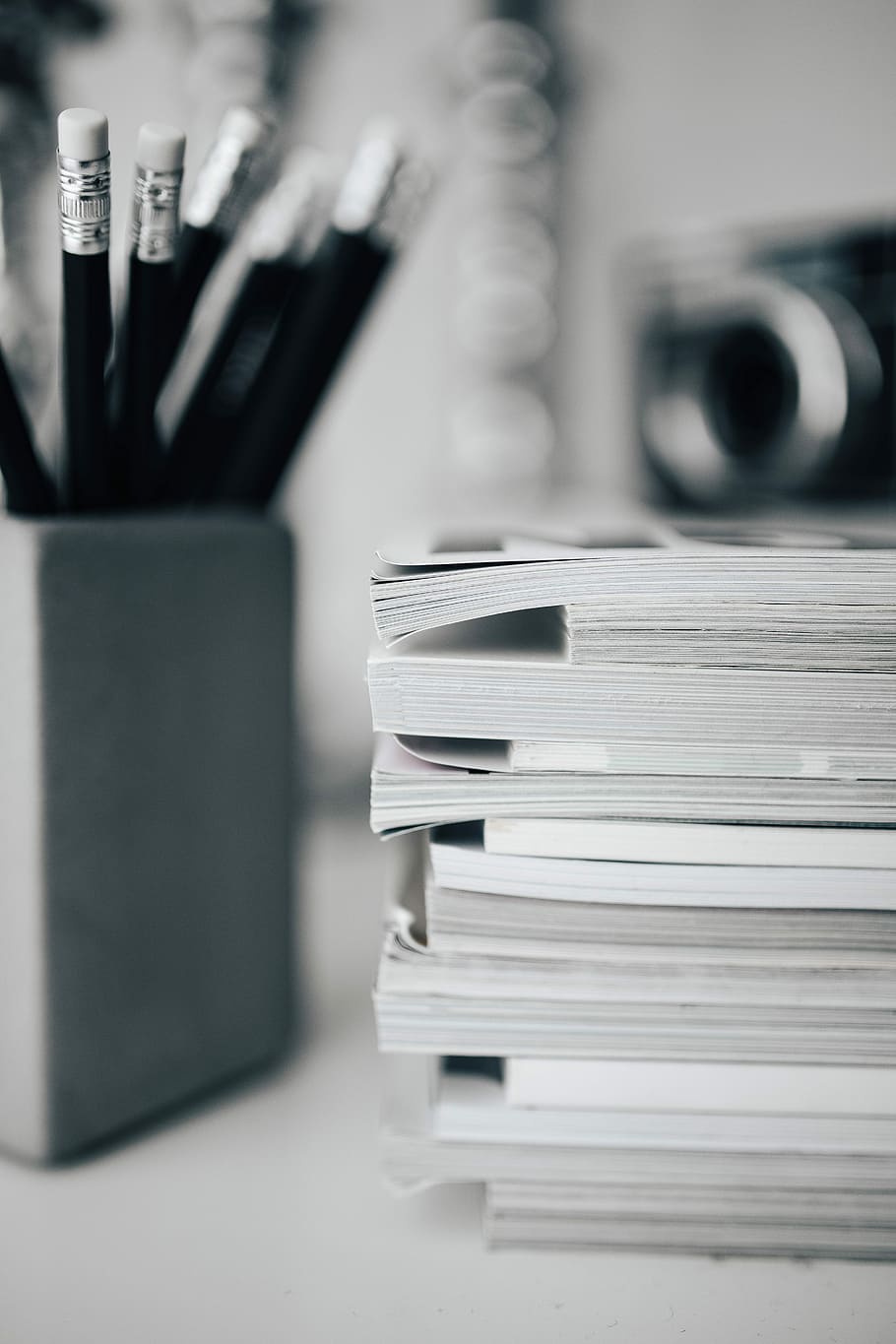 Pencils, magazines and an old lightbulb, vintage, camera, blackandwhite HD wallpaper