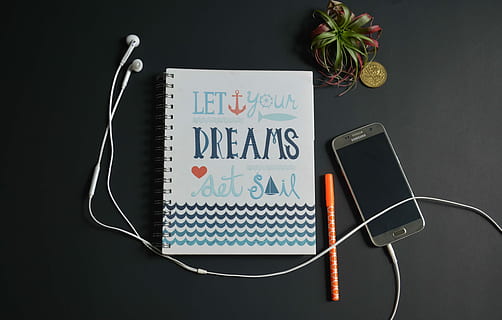 let your dreams set sail quote, gold Samsung Android smartphone beside notebook and earbuds HD wallpaper