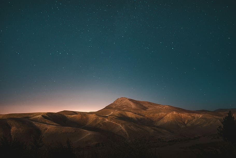 brown mountains under blue sky, photography of brown mountain HD wallpaper