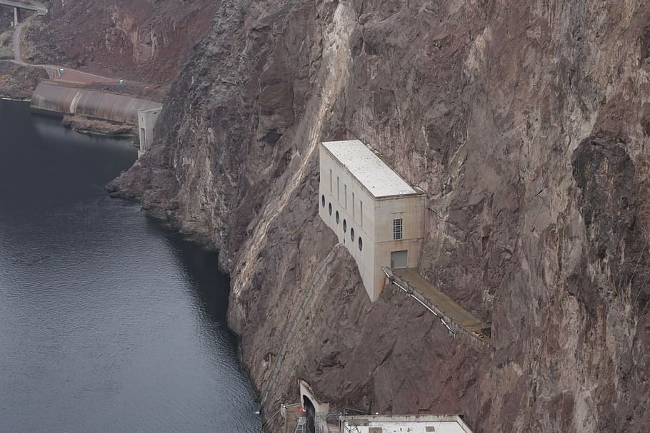 gray concrete building on side of steep hill, hoover dam, nevada