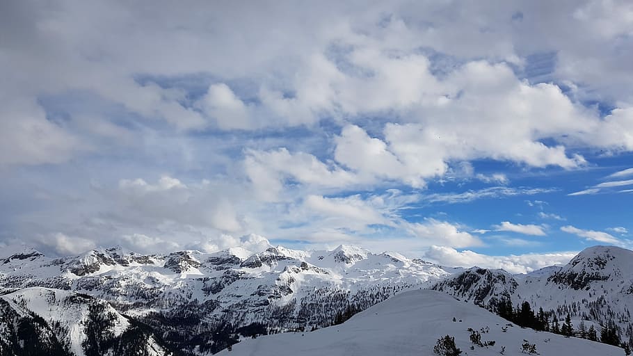 snow covered mountain under white clouds and blue sky at daytime HD wallpaper