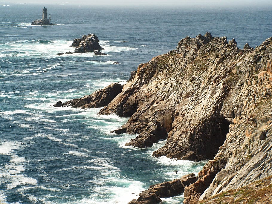 rocky mountain near lighthouse at daytime, promontory, atlantic, HD wallpaper