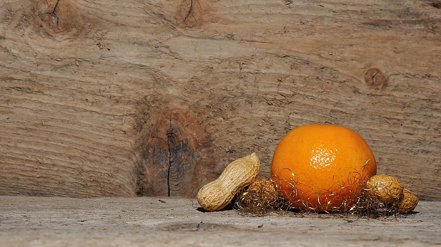 orange and peanuts on brown wooden board, mandarin, christmas HD wallpaper