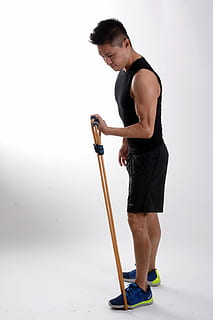 man in black tank top doing exercise, boy, elastic rope, exercise equipment HD wallpaper