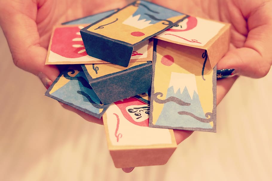 paper arts on hand, human Hand, holding, toy, people, house, paper currency HD wallpaper