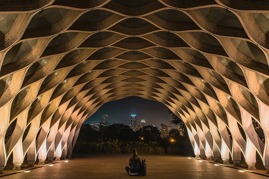 person sitting inside a brown tunnel, person sits inside tunnel HD wallpaper
