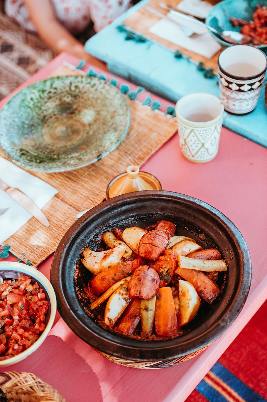 flavored food on bowl beside plate on top of table, cooked potato with egg on pot near cups HD wallpaper