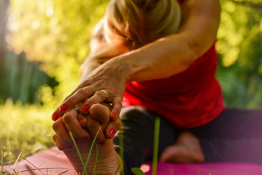 woman wearing red shirt with gold wedding ring working yoga HD wallpaper