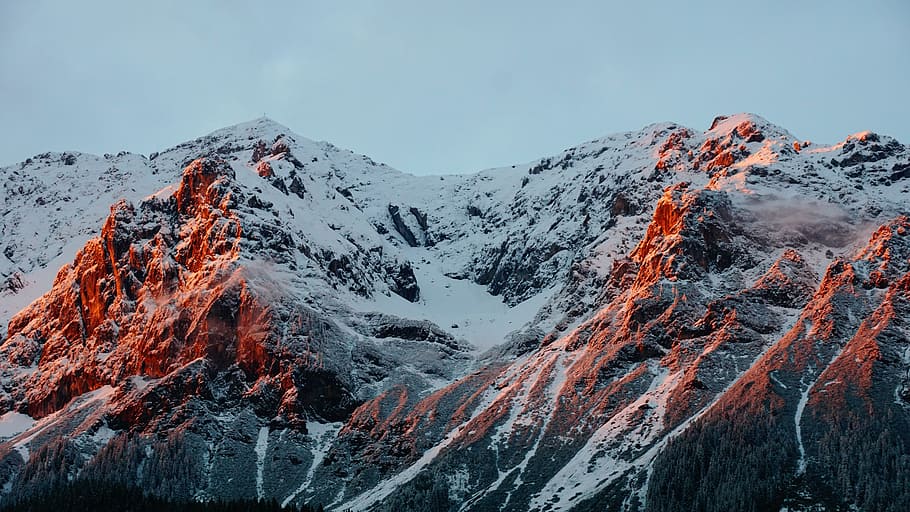 photo of mountain covered of snow during cloudy sky, white and gray mountain during daytime HD wallpaper