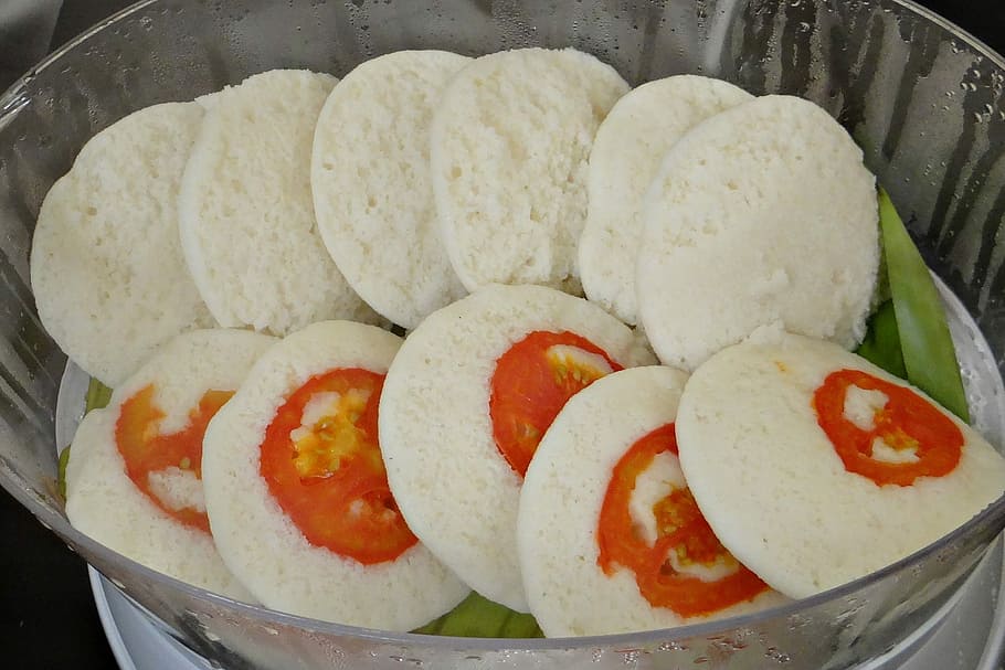 Idly sambar or Idli with Sambhar and green, red chutney. Popular South  indian breakfast 15933612 Stock Photo at Vecteezy