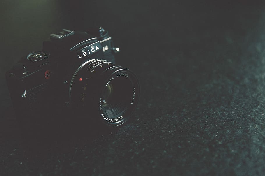 black Leica DSLR camera on black ground, black Leica DSLR camera HD wallpaper