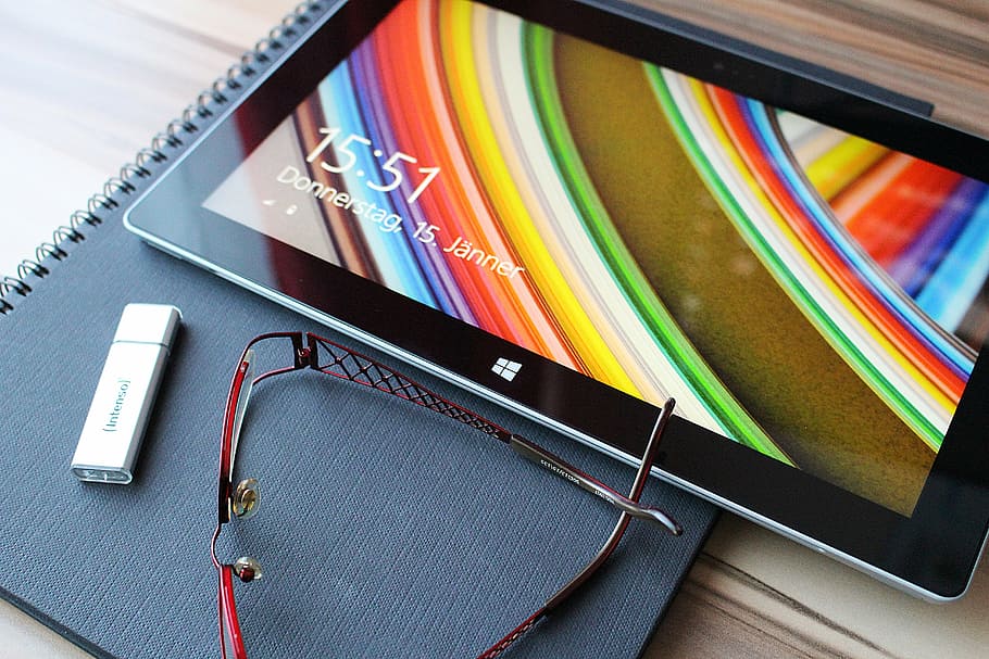 black windows tablet, eyeglasses and flashdrive, touch screen HD wallpaper