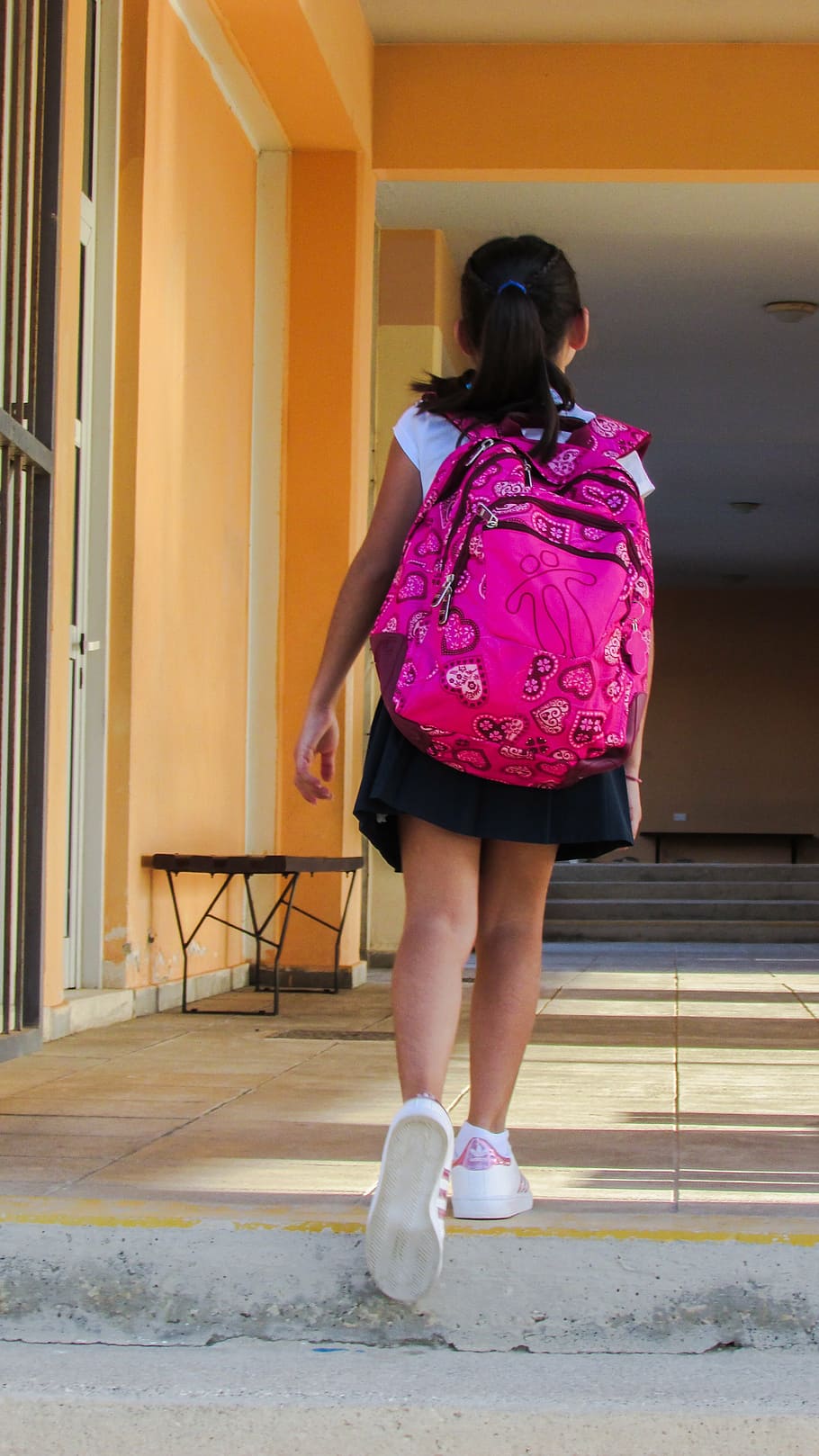 girl wearing backpack while walking on pathway, student, school