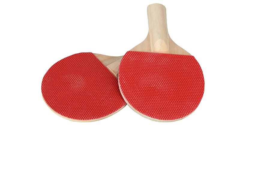 Royalty-Free photo: Two red-and-brown ping pong rackets