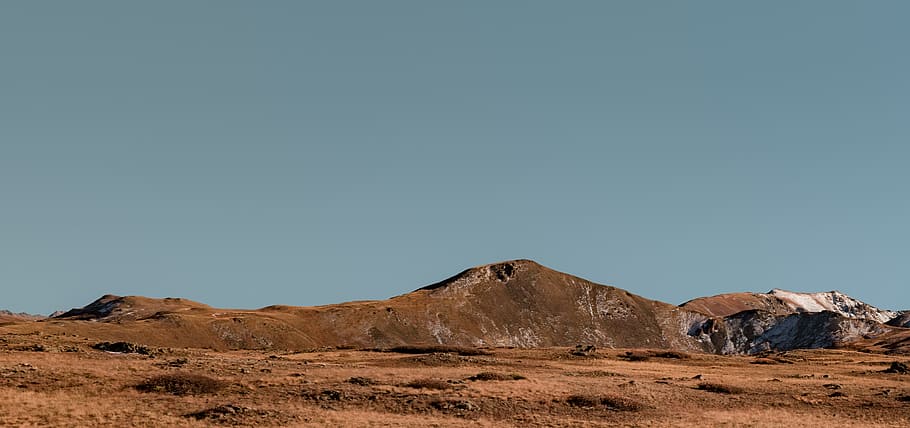 mountain under blue sky, landscape photograph of brown mountain HD wallpaper