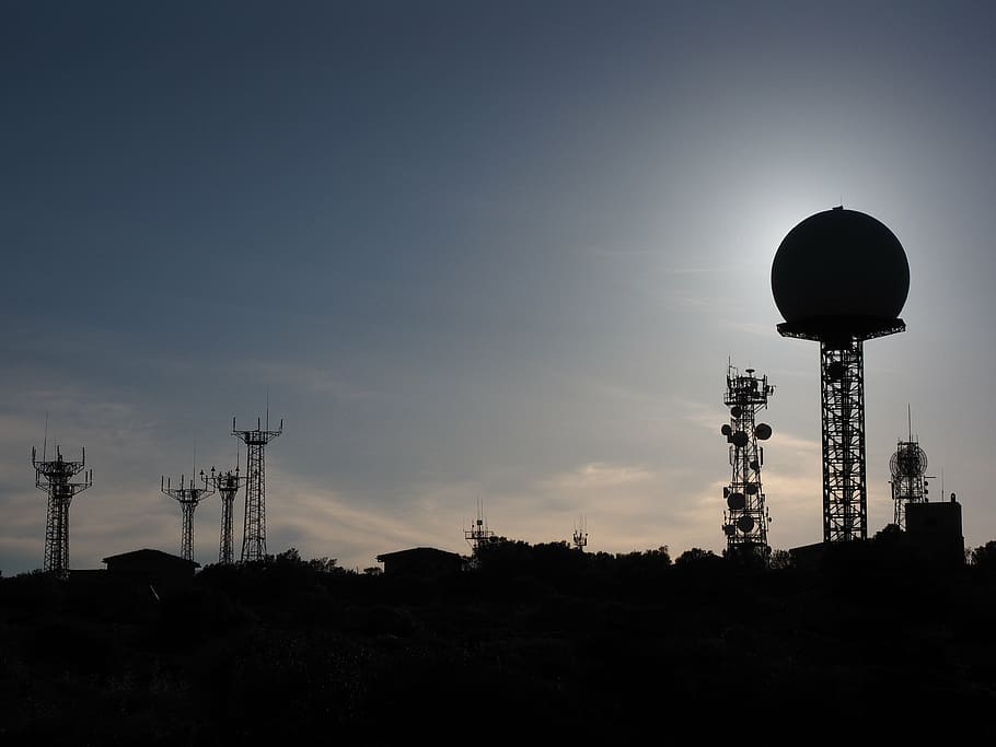 silhouette of tower at daytime, antennas, radar equipment, balloon-like