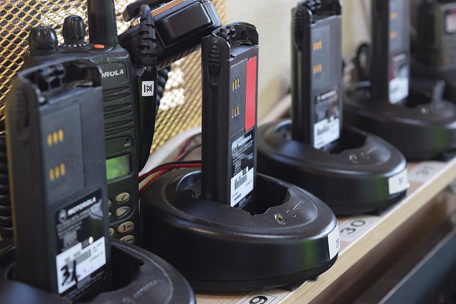 selective focus photo of black Motorola 2-way radio chargers, HD wallpaper