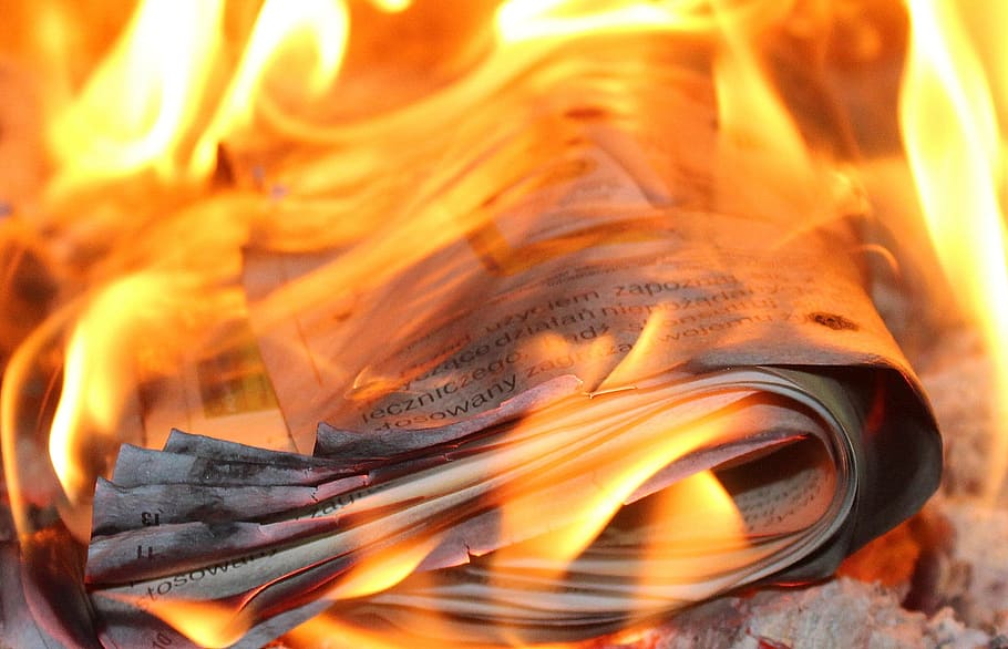 burning paper, fire, flames, the burning of the newspaper, glow