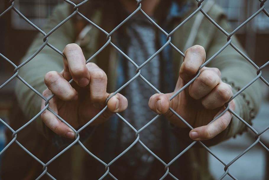 person holding gray link fence, people, hand, outdoor, prison, HD wallpaper