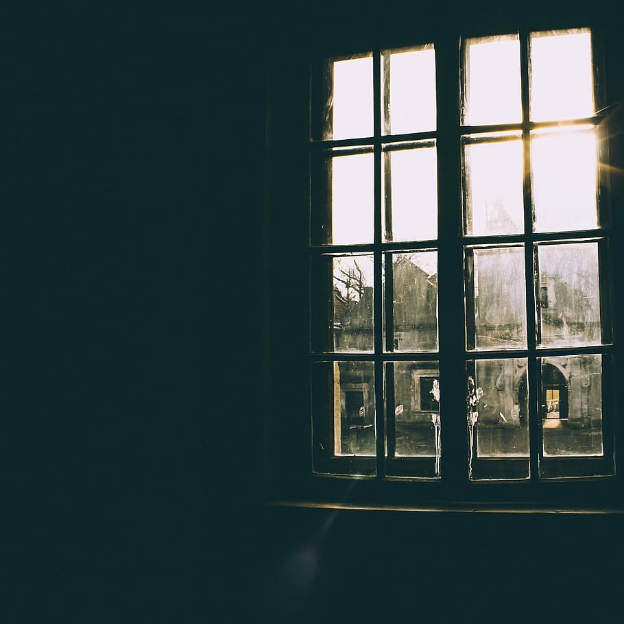 photo of casement window, dark, sun, sun glare, indoors, day
