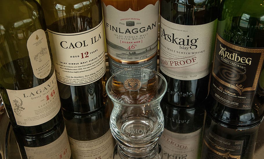 assorted-brand wine bottles, scotland, islay, whisky, distillery
