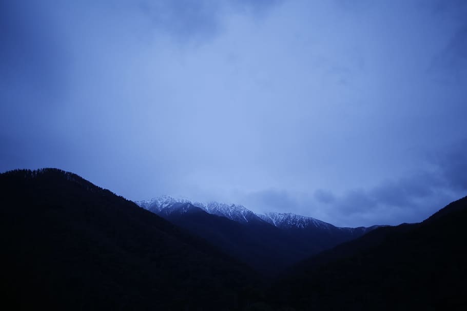 mist and mountain photography, silhouette, mountain, cumulus, nimbus, clouds, snow HD wallpaper