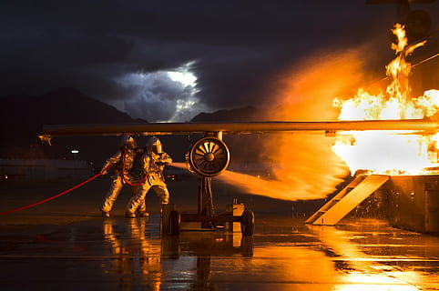 two firemen holding hose near fire, firefighters, training HD wallpaper