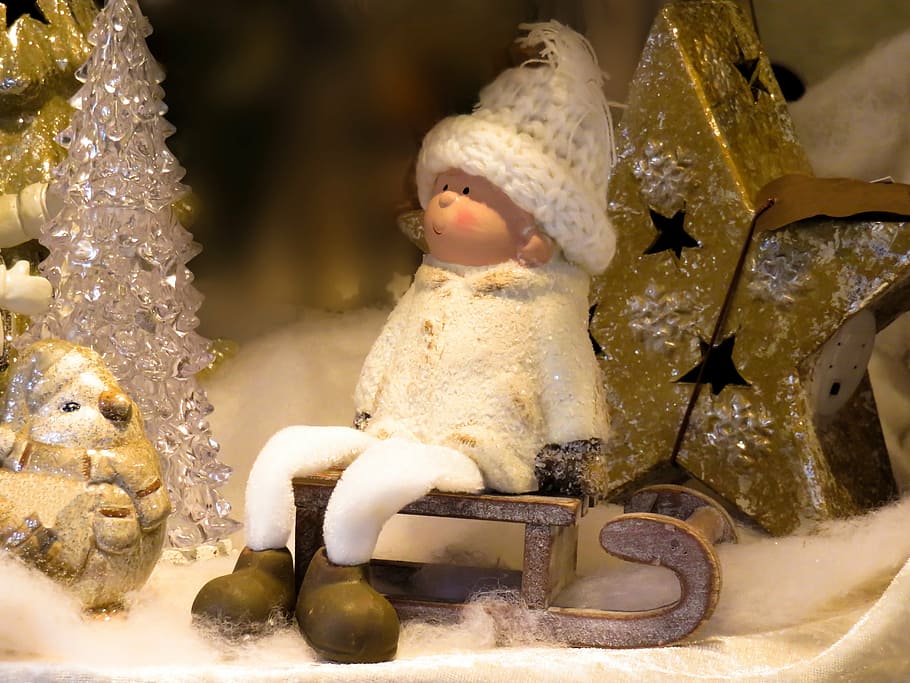 dwarf figurine on brown sled, christmas, slide, winter, snow