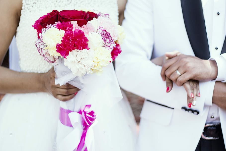 woman holding red and white flower bouquet, couple holding hands wedding dayt, HD wallpaper