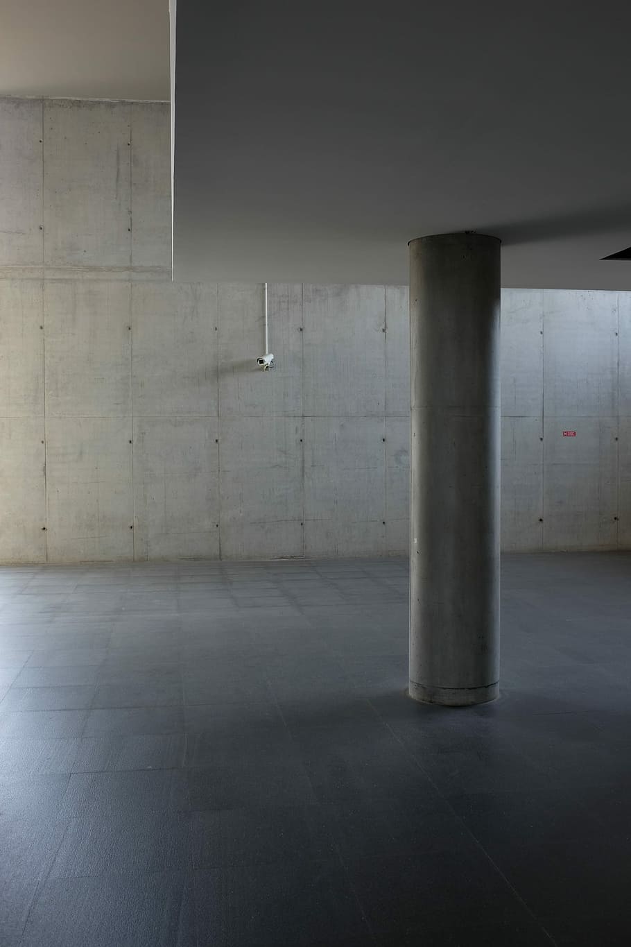gray floor tiles and gray concrete wall, indoors, flooring, empty