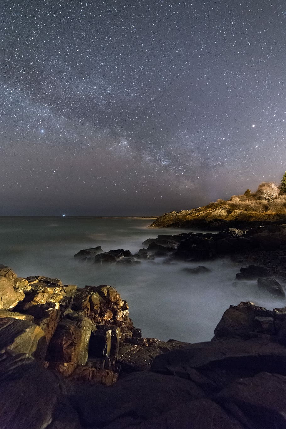 mountains under starry sky, rock mountain with fogs under starry sky HD wallpaper
