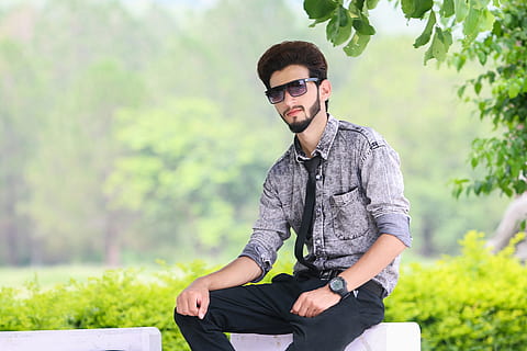 A stylish boy posing near the garden - PixaHive