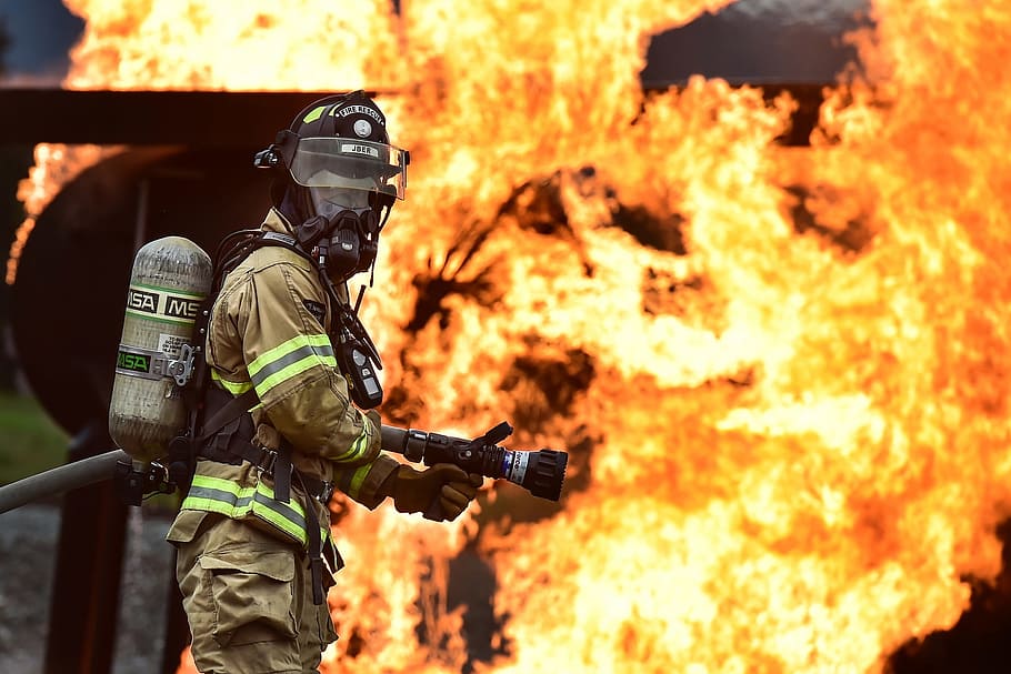 fireman catching fire wearing a mask, firefighter, training, live