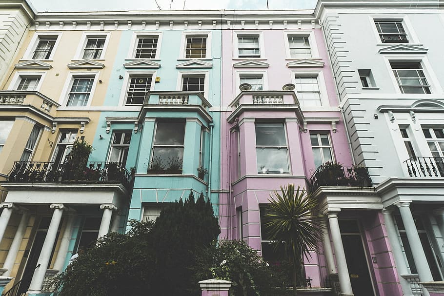 architectural photography of buildings, teal, yellow, white, pink