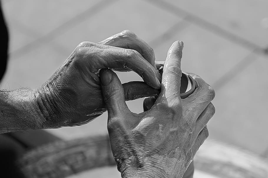 person holding hand tool, grayscale photo of human hand, pottery HD wallpaper