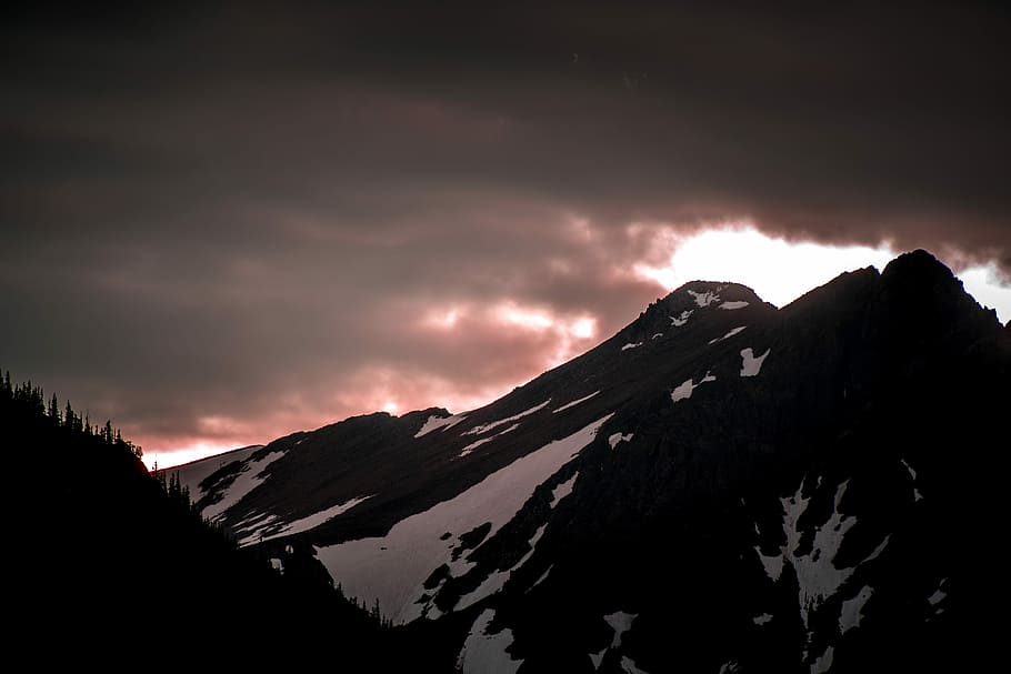 silhouette of mountain range, mountain with ice filled near trees HD wallpaper