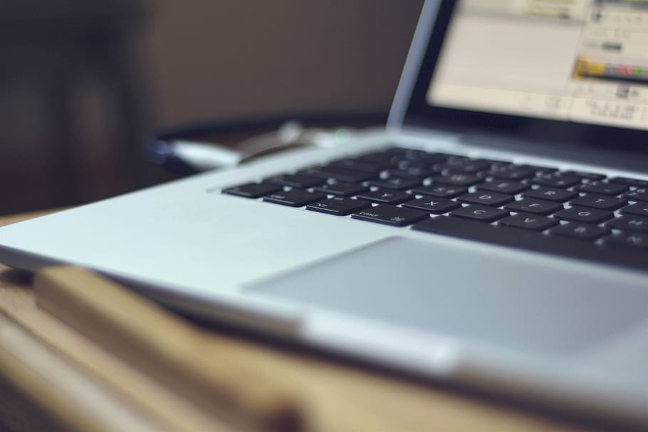 selective focus photography of turned MacBook Pro, notebook HD wallpaper