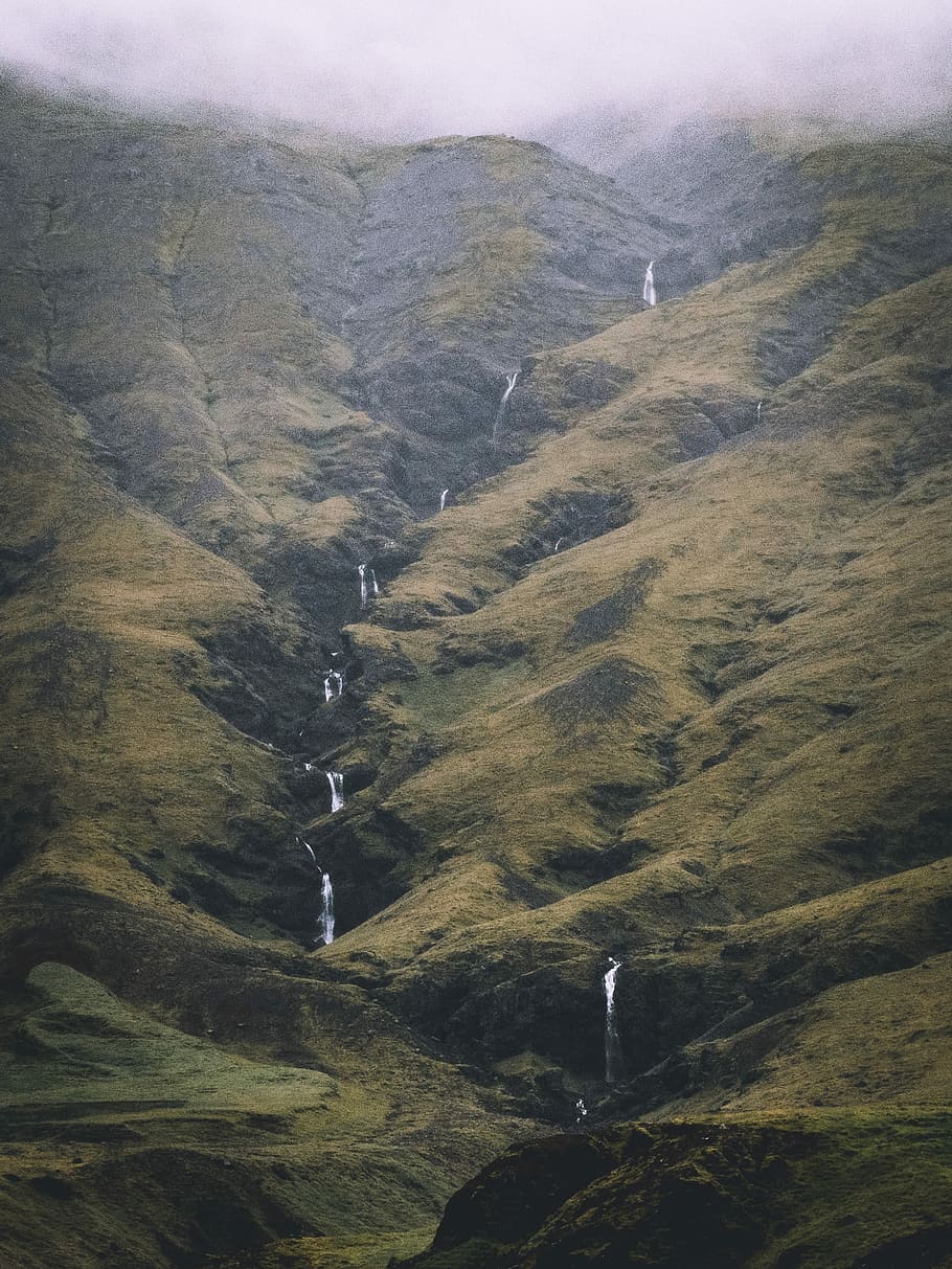 gray mountain with falls, green mountain with waterfalls at daytime HD wallpaper